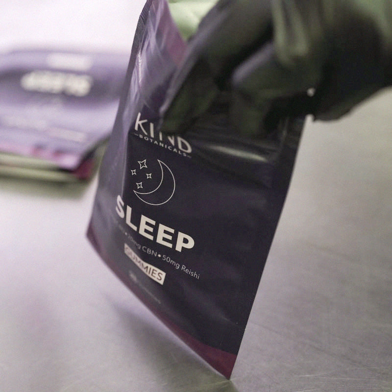 KIND Sleep Gummy bag bring filled in our Colorado lab.