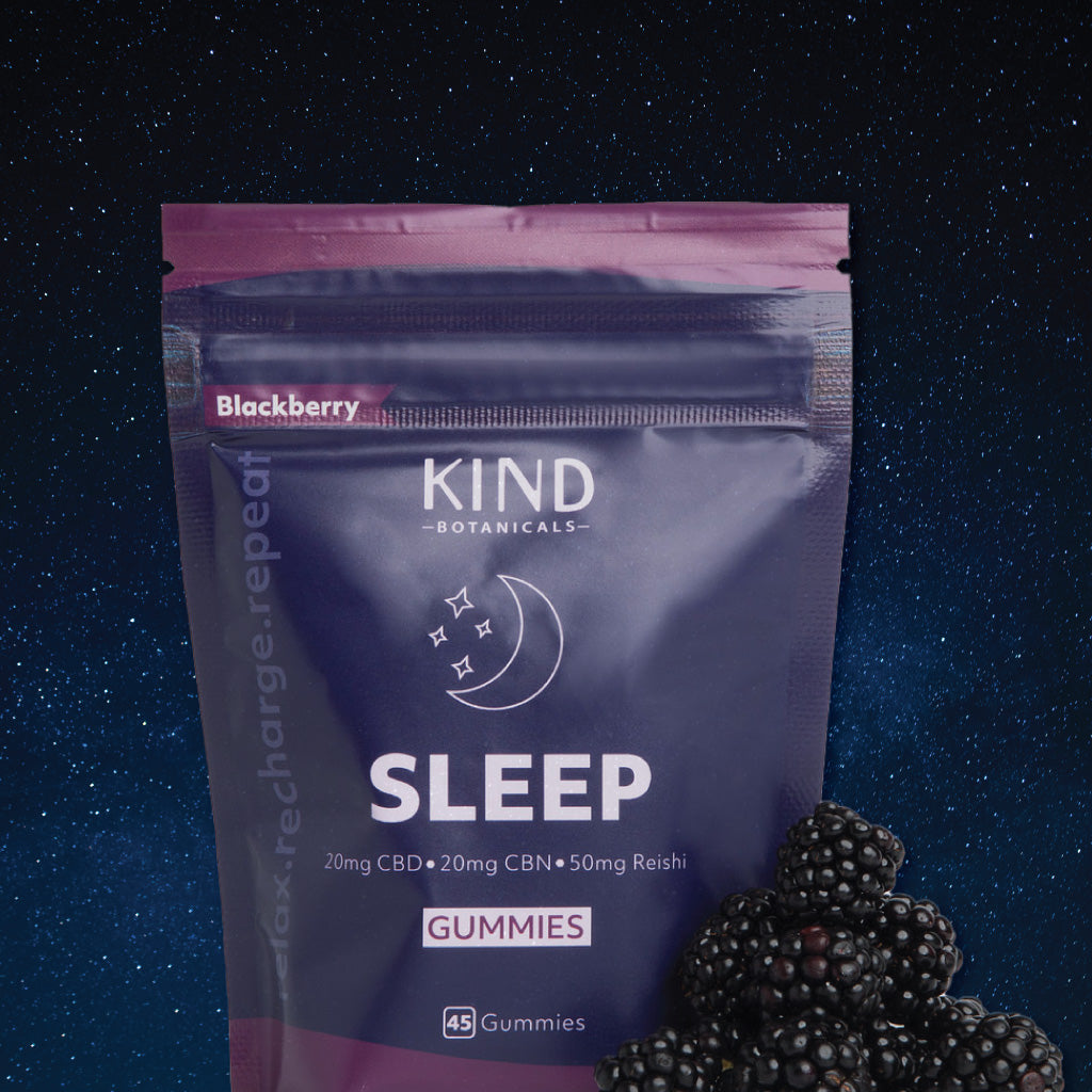Purple packaging of Kind Botanicals Sleep Gummies with blackberries on a starry night background
