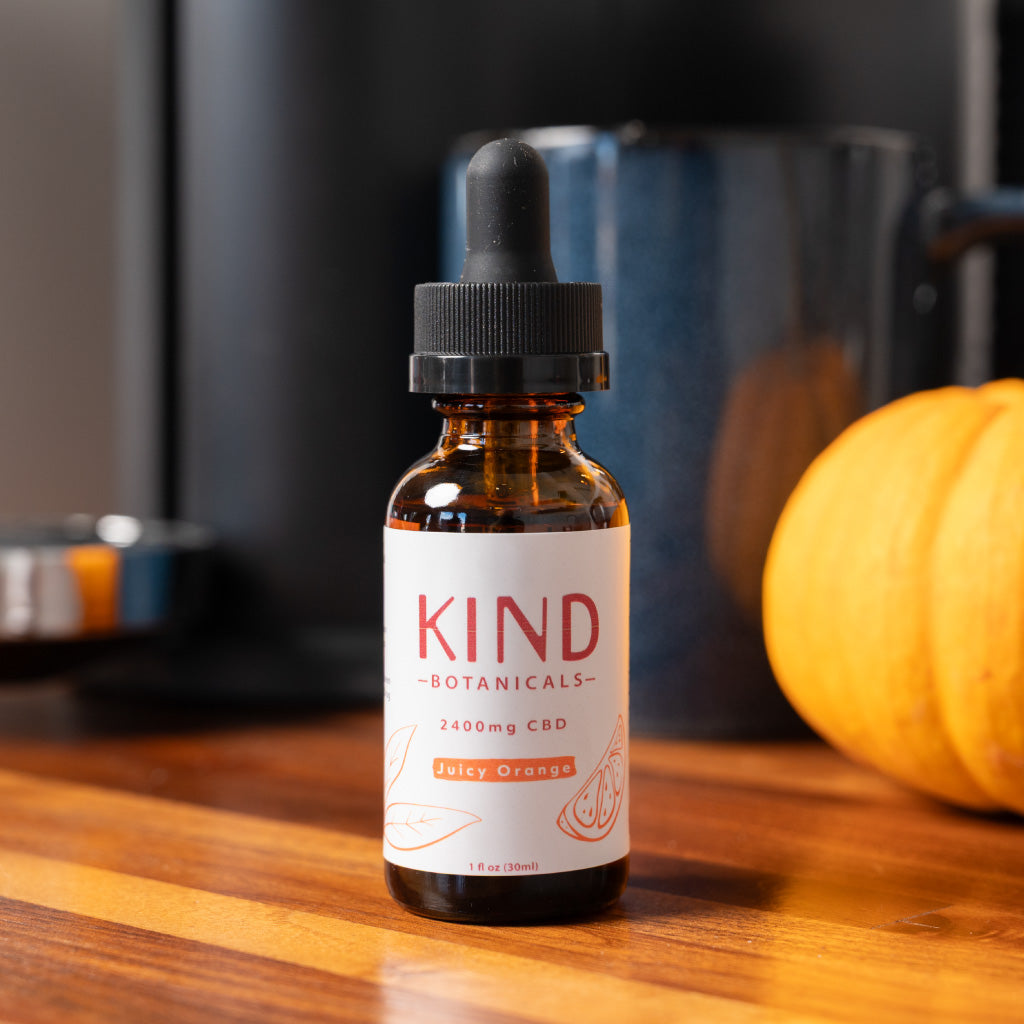 KIND brave CBD drops on a kitchen counter