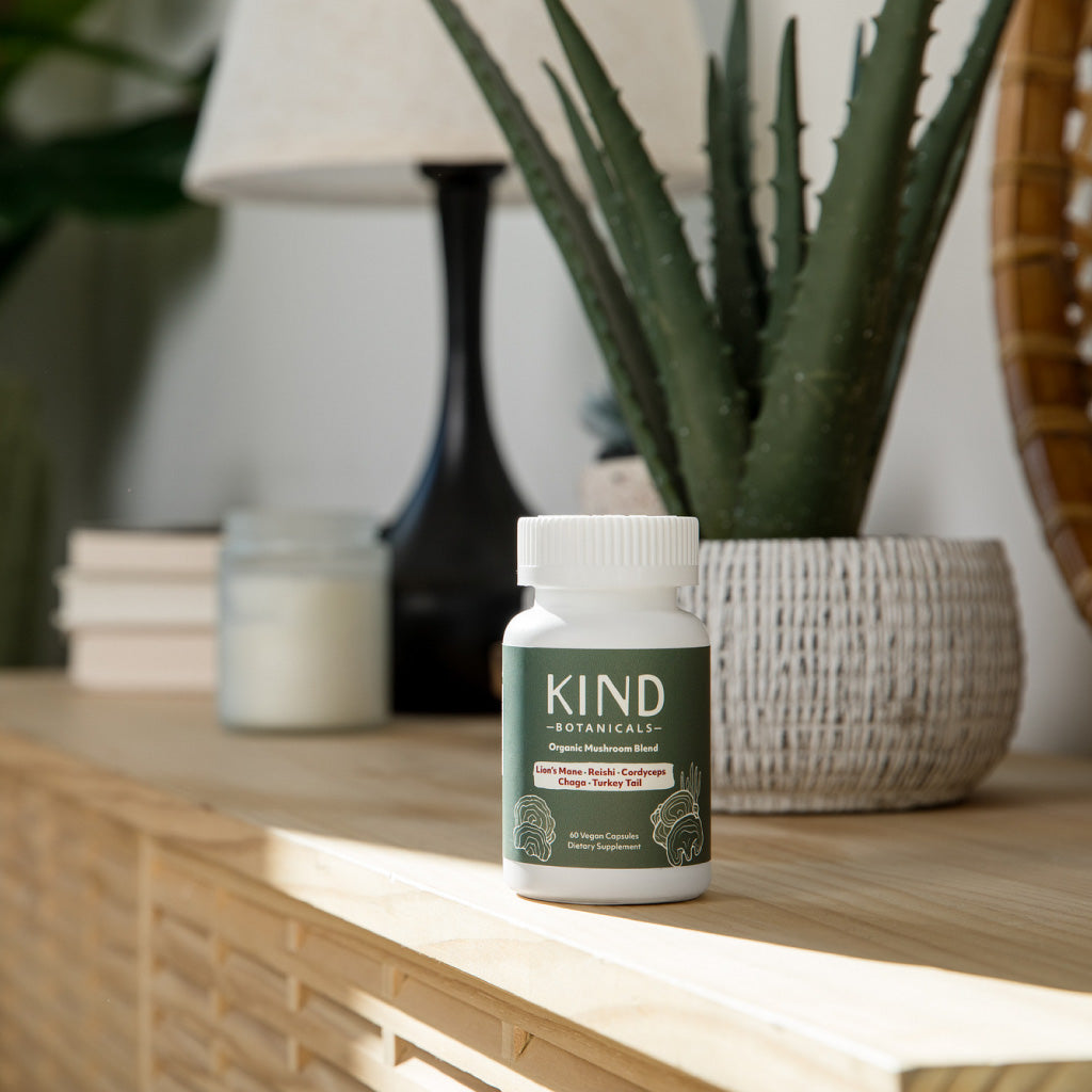 Bottle of KIND Botanics on a wooden surface with a blurred background